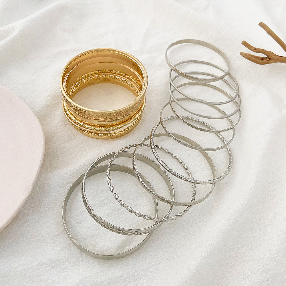 Wholesale Broad Gold Glossy 10-piece Alloy Bracelet Set
